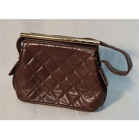 chanel smooth gold vintage laundry bar purse image|antique Chanel.